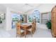Dining area featuring a view of the pool at 910 Via Tripoli, Punta Gorda, FL 33950