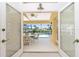 Open patio with view of the pool and lush backyard at 910 Via Tripoli, Punta Gorda, FL 33950