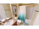 Bathroom with shower and tub combo with a vanity with marble countertop and modern fixtures at 10068 Winding River Rd, Punta Gorda, FL 33950