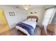 Inviting bedroom featuring neutral colors, ceiling fan, and a decorative fish theme at 10068 Winding River Rd, Punta Gorda, FL 33950