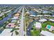 Aerial view of a waterfront community showcasing canal access, lush landscapes, and proximity to the ocean at 1080 Bal Harbor Blvd # 11C, Punta Gorda, FL 33950