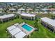 Community aerial view of the pool and surrounding condos at 1080 Bal Harbor Blvd # 11C, Punta Gorda, FL 33950