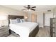 This bedroom is bright and features a large bed and dark wood furniture at 1080 Bal Harbor Blvd # 11C, Punta Gorda, FL 33950