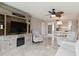 Living space showcasing stylish decor, an entertainment center, and an open layout connecting to the dining area and kitchen at 1080 Bal Harbor Blvd # 11C, Punta Gorda, FL 33950