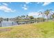 Beautiful waterfront property with private dock and lush tropical landscaping at 1080 Bal Harbor Blvd # 11C, Punta Gorda, FL 33950