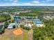 Aerial view of community amenities including tennis courts, pools, and recreational facilities at 11982 Granite Woods Loop, Venice, FL 34292