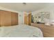 A bright bedroom with a large dresser, closet, and comfortable bed, offering plenty of space at 12018 Saragossa Ln, North Port, FL 34287