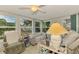 Bright sunroom filled with natural light, perfect for relaxation and enjoying the outdoor views at 12018 Saragossa Ln, North Port, FL 34287