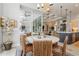Elegant dining area provides backyard views and access to kitchen, living room, and outdoor seating at 1306 Osprey Dr, Punta Gorda, FL 33950