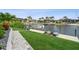 Home features a private boat dock with boat lift and lounge chairs, offering convenient waterfront access at 1306 Osprey Dr, Punta Gorda, FL 33950