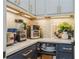 Well-organized kitchen with white countertops and modern appliances offers convenience and style at 1306 Osprey Dr, Punta Gorda, FL 33950