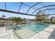 Relaxing screened pool area with spa and views of the canal at 1306 Osprey Dr, Punta Gorda, FL 33950