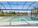 Screened pool with spa and waterfront views at 1306 Osprey Dr, Punta Gorda, FL 33950