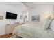 Comfortable bedroom with a ceiling fan, providing a relaxing space for rest at 1327 Hedgewood Cir, North Port, FL 34288