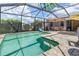 Inviting screened pool with patio area, perfect for outdoor entertaining and relaxation at 1327 Hedgewood Cir, North Port, FL 34288