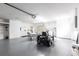 Finished garage featuring a laundry area, workshop, and ample storage space at 14534 Keene Ave, Port Charlotte, FL 33953