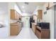 Kitchen featuring wooden cabinets and a full suite of appliances at 14534 Keene Ave, Port Charlotte, FL 33953