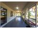 Enclosed lanai with plenty of light, providing a relaxing space with views of the backyard at 14534 Keene Ave, Port Charlotte, FL 33953