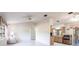 This home features an open layout of the living and kitchen area. The living room features tile flooring at 14534 Keene Ave, Port Charlotte, FL 33953