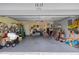 Spacious two car garage with lots of storage and a side entry door at 1513 Urmey Ln, North Port, FL 34286