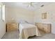 Comfortable bedroom with a twin bed, dresser, and ample natural light from the window at 158 Norman St, Port Charlotte, FL 33954