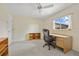 Versatile bedroom with a desk, bookshelf, and neutral decor for a flexible space at 158 Norman St, Port Charlotte, FL 33954