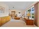 Bright living room with a large window and comfortable seating, creating a cozy atmosphere at 158 Norman St, Port Charlotte, FL 33954