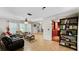 Spacious living room featuring tiled floors, ample seating, and direct access to other rooms at 22498 Westchester Blvd, Punta Gorda, FL 33980
