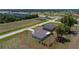 Property aerial showing the home's layout and its proximity to nearby amenities at 25046 Doredo Dr, Punta Gorda, FL 33955
