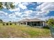 Screened lanai extending the living space of this home, perfect for enjoying the outdoors at 25046 Doredo Dr, Punta Gorda, FL 33955