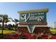 Elegant community sign for Burnt Store Village, a deed-restricted neighborhood at 25046 Doredo Dr, Punta Gorda, FL 33955