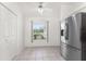 Breakfast nook with natural lighting, complemented by stainless steel appliances, including refrigerator at 25046 Doredo Dr, Punta Gorda, FL 33955