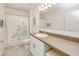 Bathroom features a shower/tub combo, vanity, and stylish decor at 25324 Aysen Dr, Punta Gorda, FL 33983