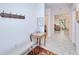Foyer and entry way with table, bench and coat rack at 25324 Aysen Dr, Punta Gorda, FL 33983