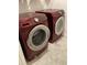 Laundry room featuring new, front-loading Samsung washer and dryer units at 25324 Aysen Dr, Punta Gorda, FL 33983