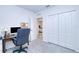 Office space with desk, closet, and access to another bedroom at 25324 Aysen Dr, Punta Gorda, FL 33983