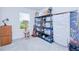 Neat storage room with shelving and natural light at 25324 Aysen Dr, Punta Gorda, FL 33983