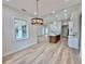Open floor plan with modern kitchen at 2743 Begonia Ter, North Port, FL 34286