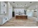 This open floor plan has a kitchen island at 2743 Begonia Ter, North Port, FL 34286