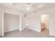 Bright bedroom features walk-in closet and an ensuite bathroom at 27444 Corinthian Dr, Punta Gorda, FL 33955