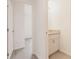 Half bathroom featuring granite countertops at 27456 Corinthian Dr, Punta Gorda, FL 33955