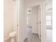 Entryway to a bathroom with a toilet at 27456 Corinthian Dr, Punta Gorda, FL 33955