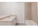 Stylish bathroom with a shower and tub combination and granite countertops at 27456 Corinthian Dr, Punta Gorda, FL 33955