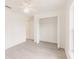 Bright bedroom with closet and a doorway to another room at 27456 Corinthian Dr, Punta Gorda, FL 33955