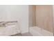 Bathroom features granite countertops, neutral-colored tiled shower, and a soaking tub at 28218 N Twin Lakes Dr, Punta Gorda, FL 33955