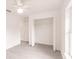 This light and bright bedroom features an open closet and a large window at 28218 N Twin Lakes Dr, Punta Gorda, FL 33955