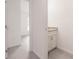 Hallway showing view into the main bedroom and attached bathroom at 28218 N Twin Lakes Dr, Punta Gorda, FL 33955
