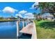 Scenic waterfront view features a private dock with easy access to the water at 2833 La Mancha Ct, Punta Gorda, FL 33950