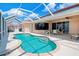 Screened pool with canal view is perfect for relaxation and entertaining at 2833 La Mancha Ct, Punta Gorda, FL 33950