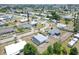 Neighborhood aerial view with lush greenery, well-maintained lawns, and charming homes at 330 Lasayette Ne Dr, Port Charlotte, FL 33952